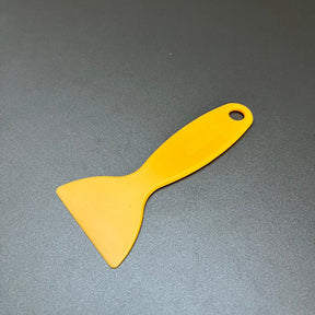 Espátula Pazinha KTM Amarela – Flexibilidade e Controle para Aplicações Detalhadas (13x6 cm)