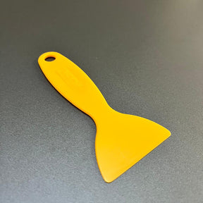 Espátula Pazinha KTM Amarela – Flexibilidade e Controle para Aplicações Detalhadas (13x6 cm)