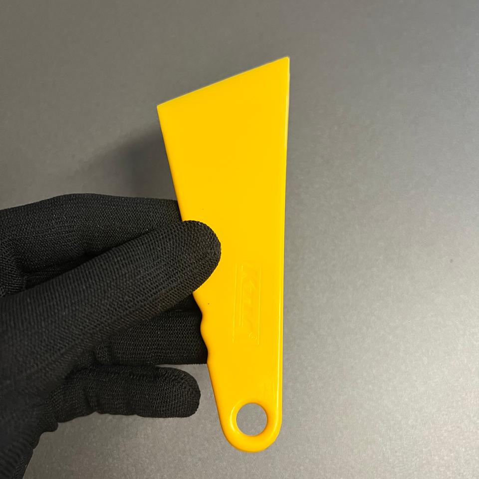 Espátula KTM Amarela – Aplicação Suave e Profissional (13x5 cm)