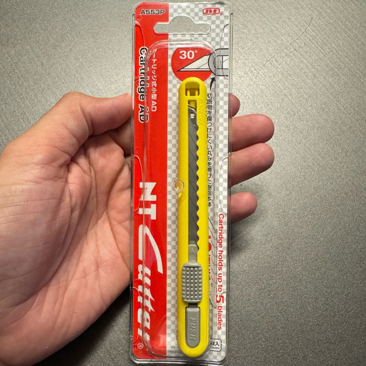 Estilete NT Cutter A553P – 9mm com deposito para 5 Lâminas (30°)