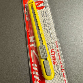 Estilete NT Cutter A553P – 9mm com deposito para 5 Lâminas (30°)
