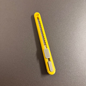 Estilete NT Cutter A553P – 9mm com deposito para 5 Lâminas (30°)